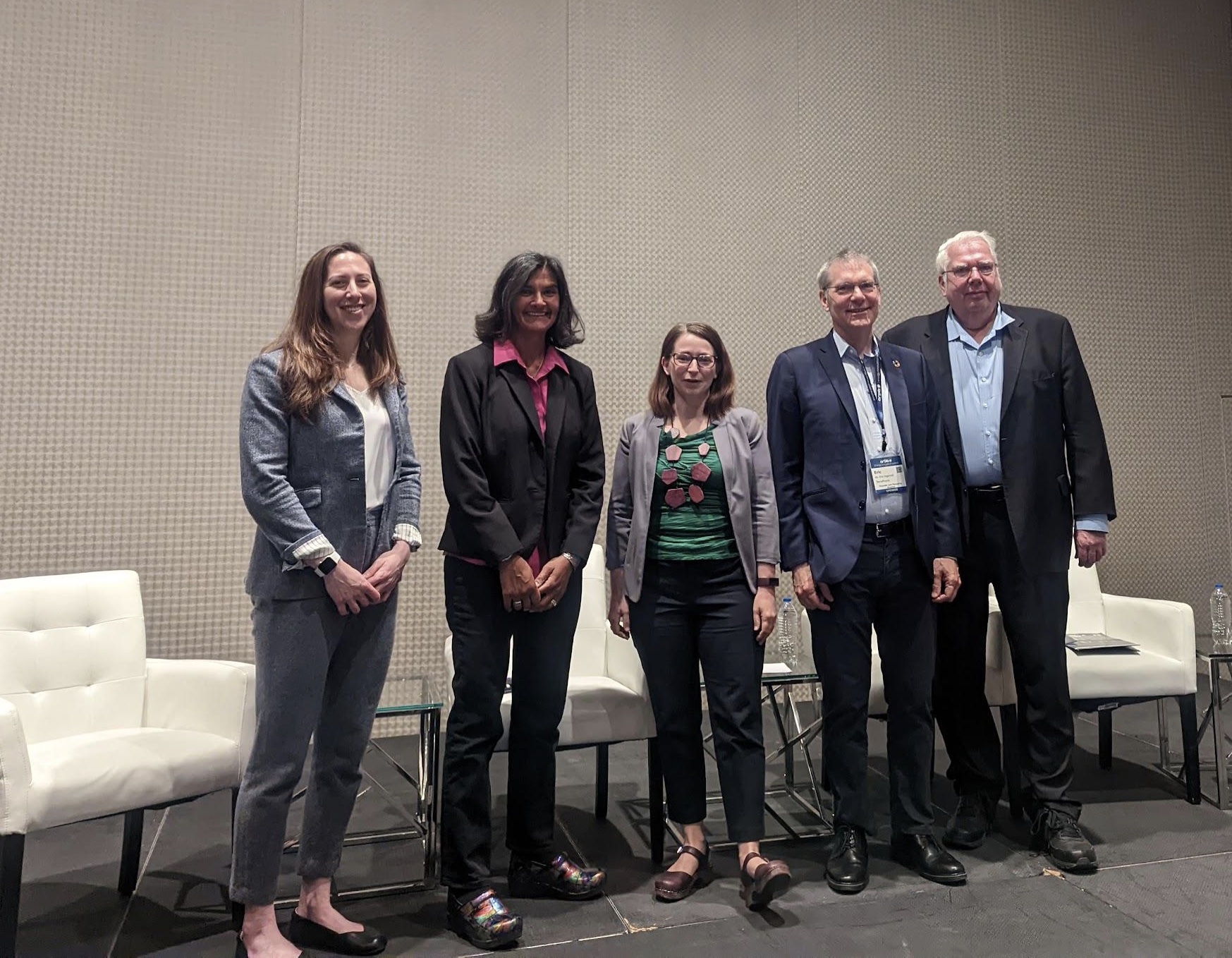 The Beyond Baseload panelists standing together after their session