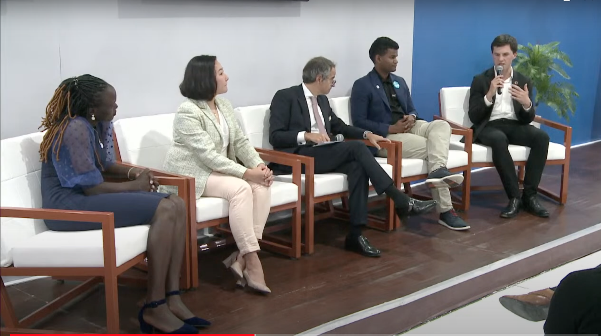 Panelists seated in armchairs during a COP27 discussion