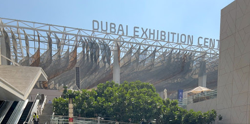 The Dubai Exhibition Centre sign at the COP28 venue