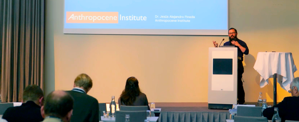Dr. Jesús Alejandro Pineda presenting at a lectern at European Nuclear Energy 2026 in Stockholm beside an Anthropocene Institute title slide