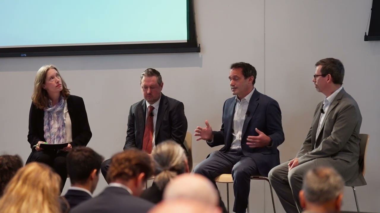 Four panelists seated on stage at Nuclear Symposium 2026 during the session New Pathways for Advanced Nuclear Licensing, with audience members in the foreground